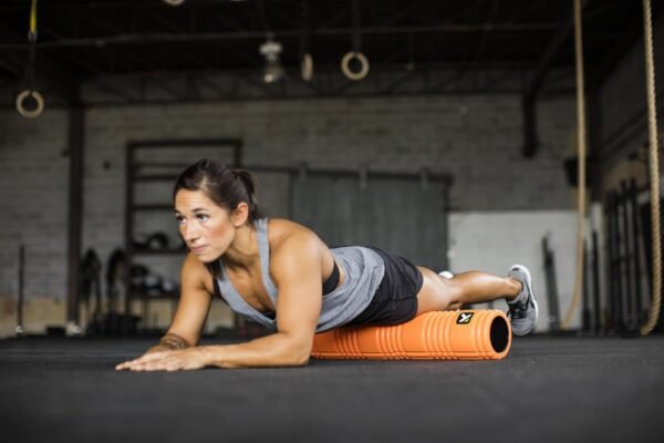 TRIGGERPOINT PERFORMANCE THERAPY GRID Patented Multi-Density Foam Massage Roller Exercise Deep Tissue Muscle Recovery - Relieves Muscle Pain & Tightness, Improves Mobility & Circulation (26"), Orange - Image 6